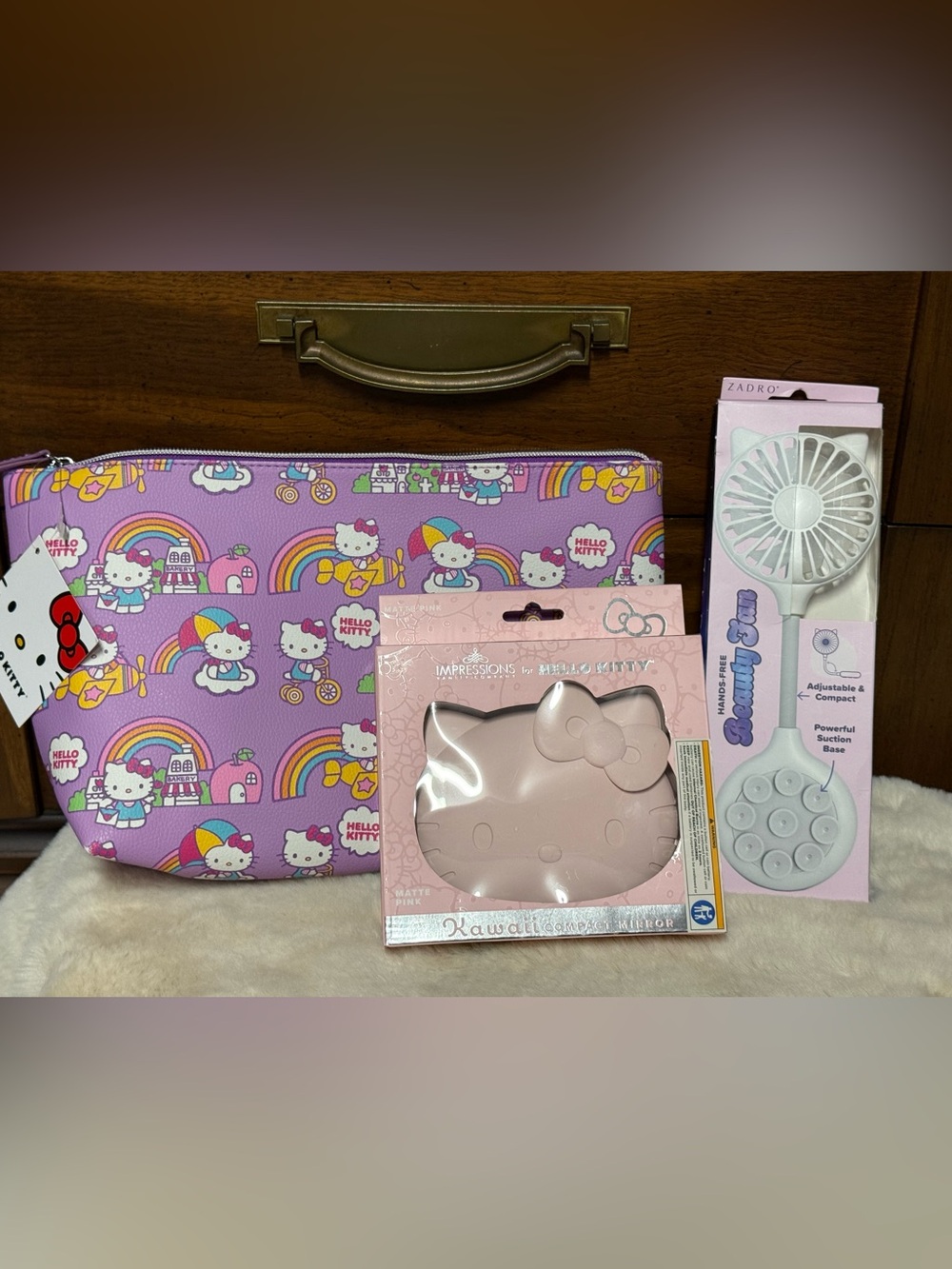 Hello Kitty NWT Large Pouch, NIB LED Mirror, and Beauty Fan NIB.  All 3.